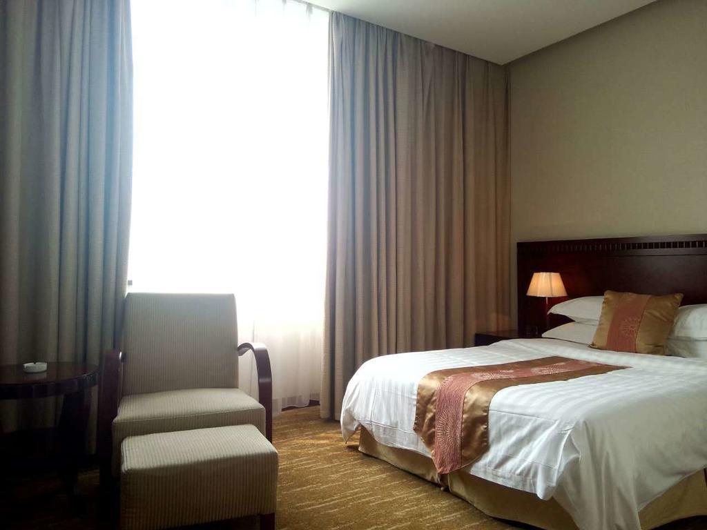 Century Hotel Tajcang Szoba fotó