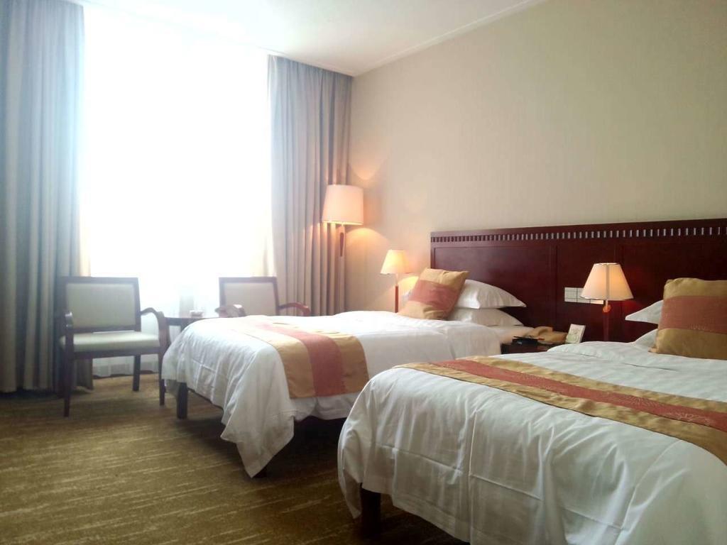 Century Hotel Tajcang Szoba fotó