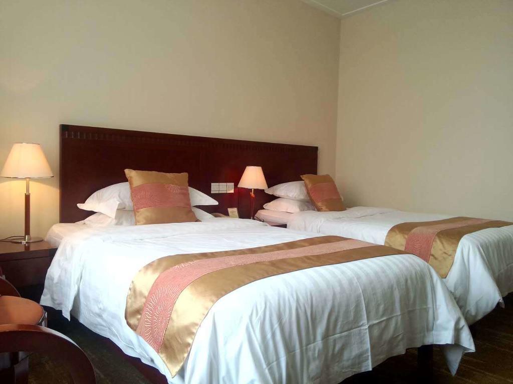 Century Hotel Tajcang Szoba fotó
